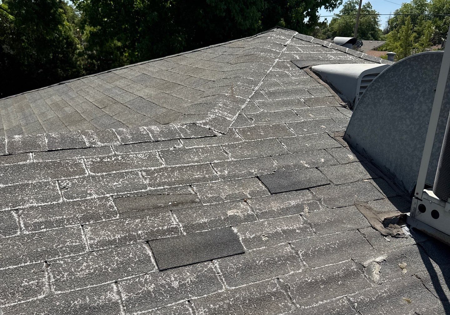 roof leak and worn shingles