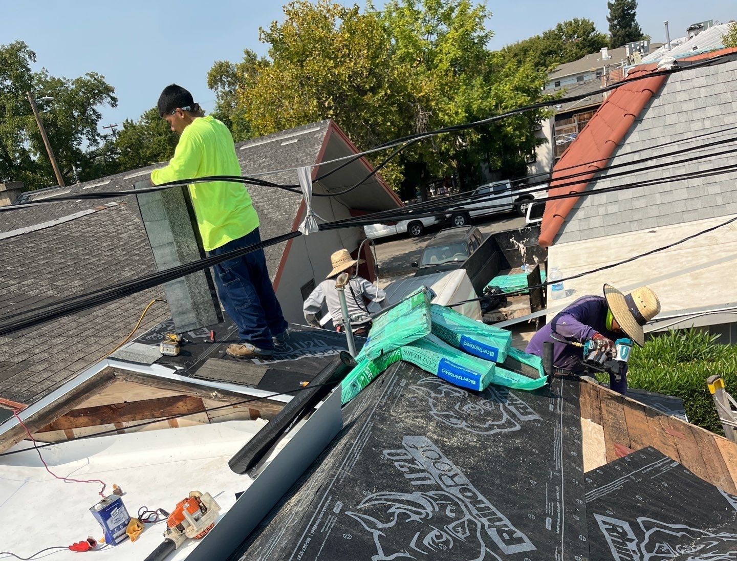 the team constructing a new roof