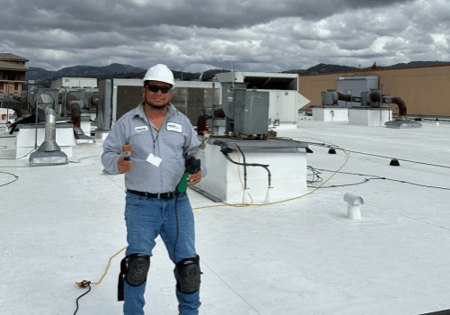 flat roof maintenance team on site