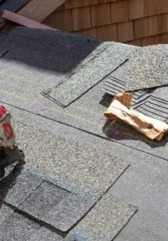 licensed Fresno roofer fixing asphalt shingle roof